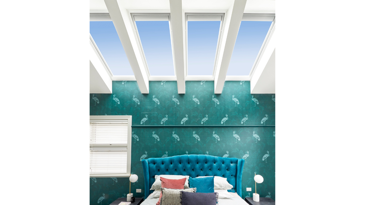 4 VELUX Skylights over green bedroom