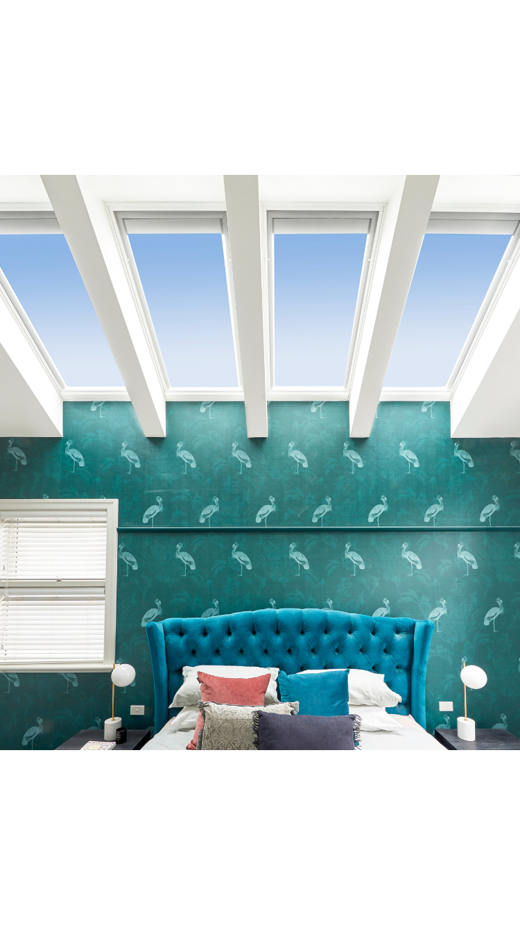4 VELUX Skylights over green bedroom