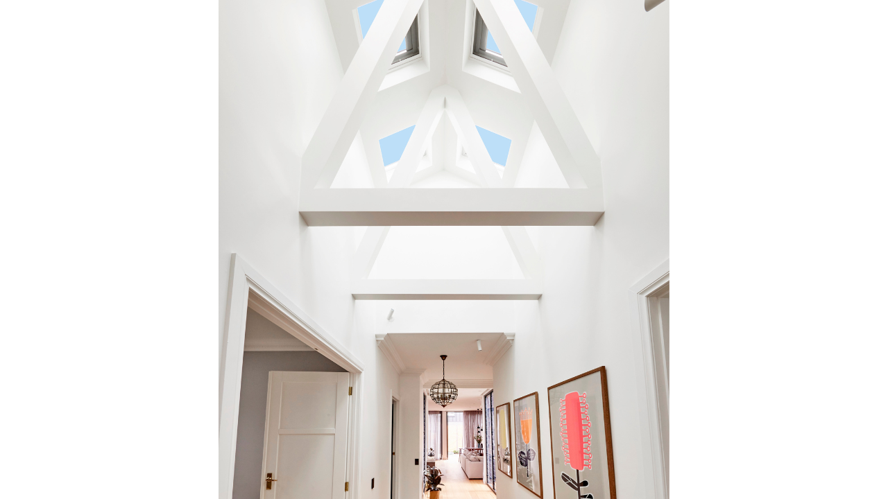 skylights over hallway white cathedral style