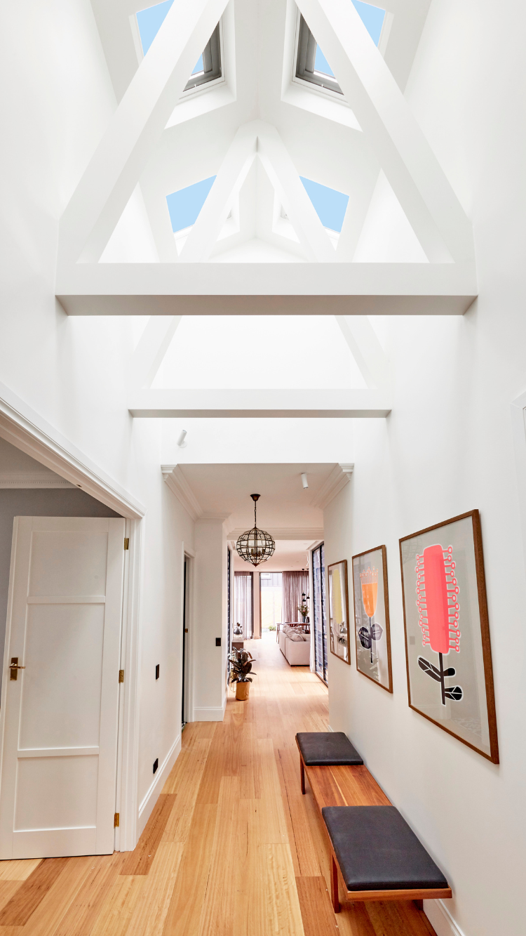 skylights over hallway white cathedral style