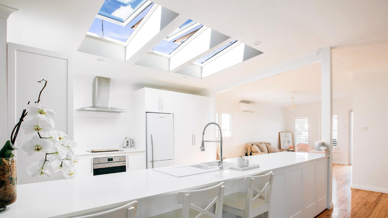 opening skylights over white kitchen