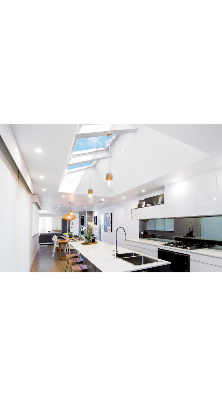 kitchen with skylight brightly lit modern