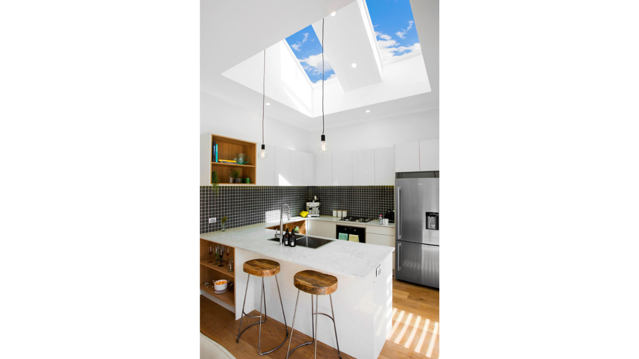 kitchen with skylight visible clouds