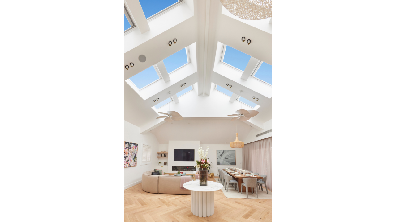 bank of skylights over living room space