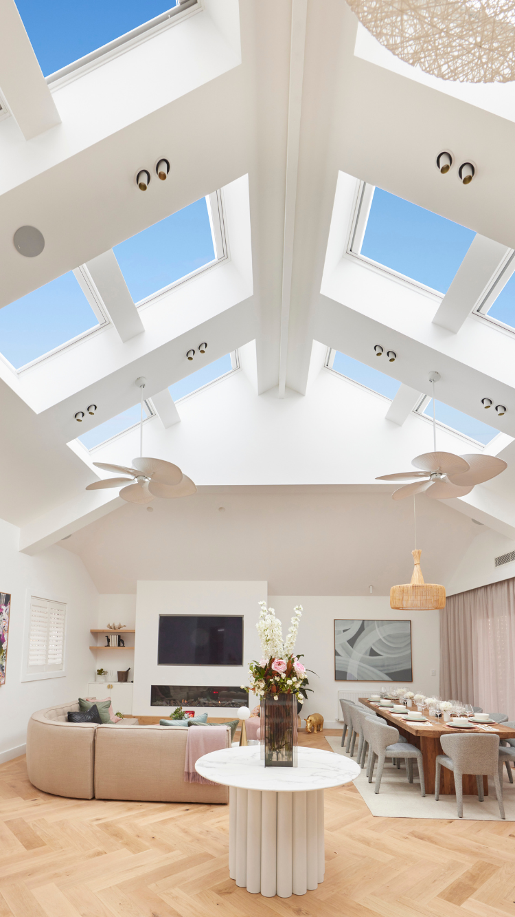 bank of skylights over living room space