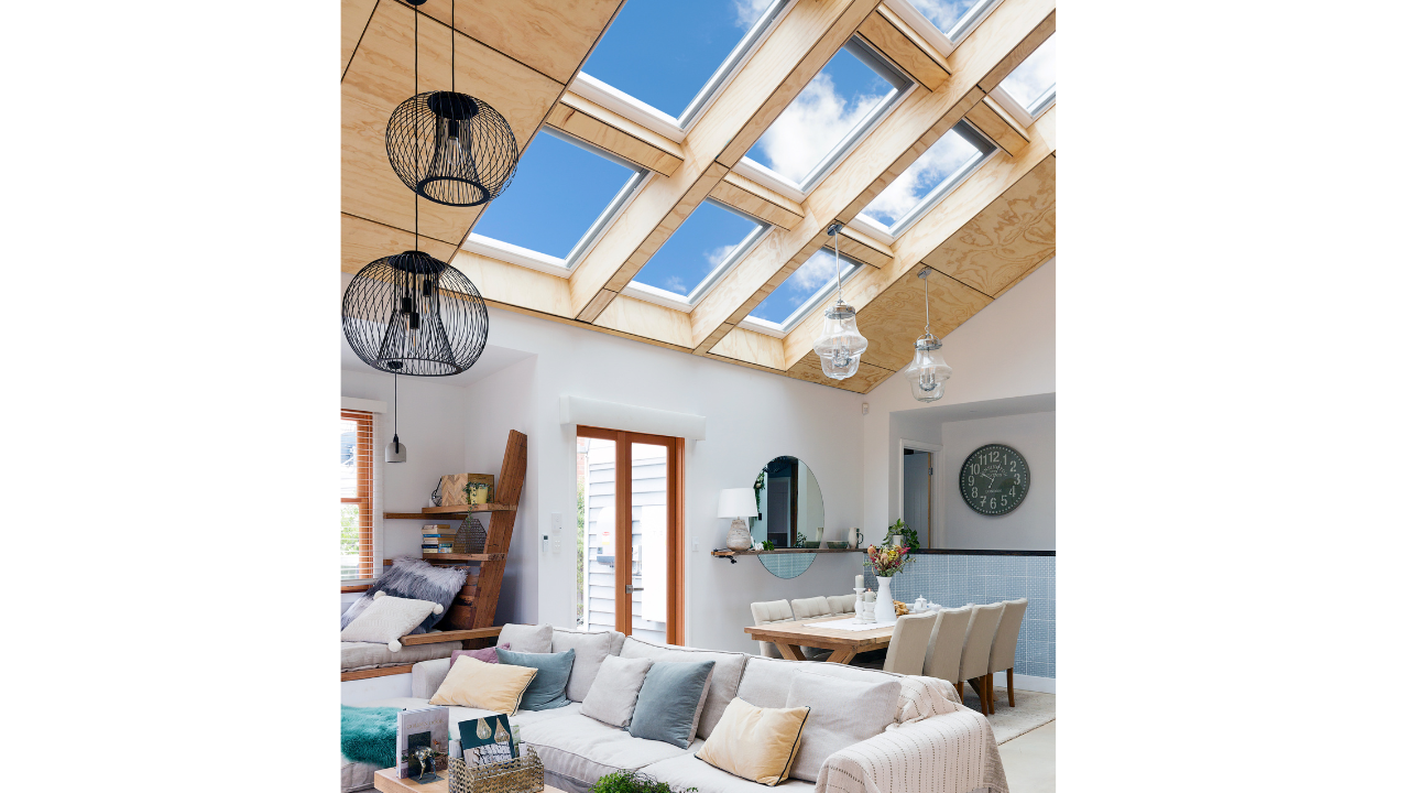 bank of skylights wooden ceiling in living room