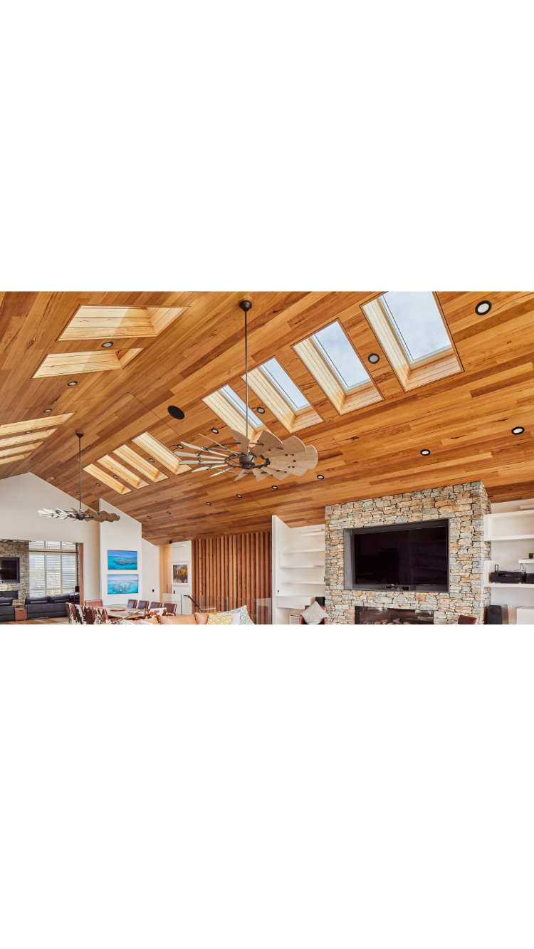 multiple skylights over cabin home
