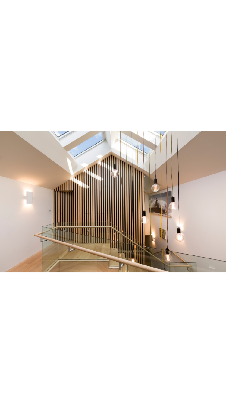 skylights over stairwell wooden home
