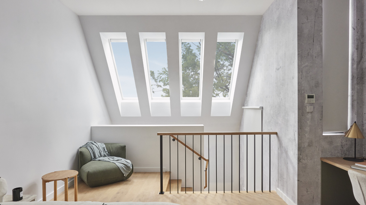 skylights over attic conversation room with stairwell