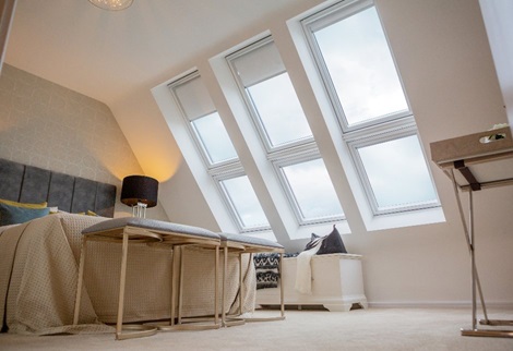 Countryside Homes guļamistaba ar VELUX jumta logiem.